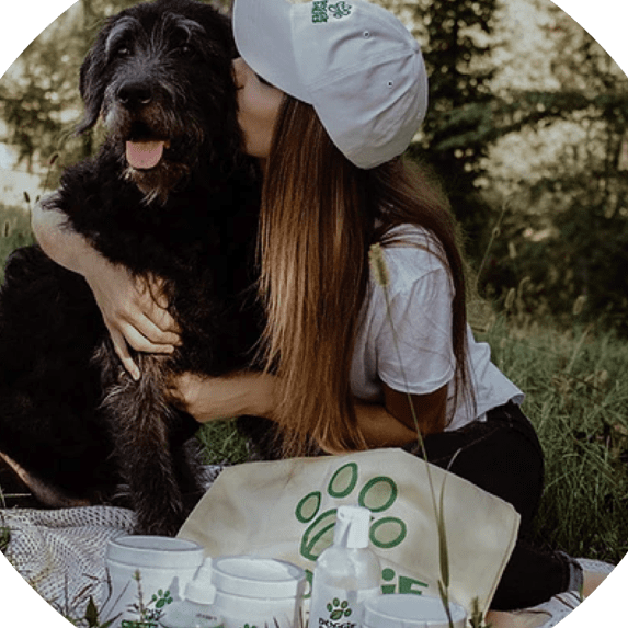 women kissing dog